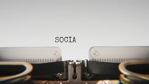 Old mechanical typewriter typing Social Security in a close-up view.