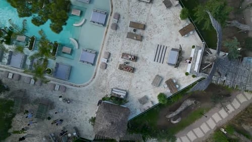 Aerial Video of Models Relaxing By Mediterranean Shore