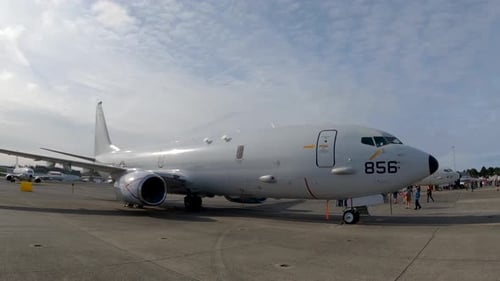 Cargo jet on US Navy runway, ready for deployment.