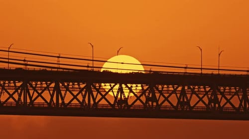 Red Sunset and Silhouette of the Bridge