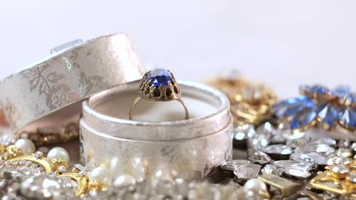 Antique ring with blue gemstone in box and jewellery
