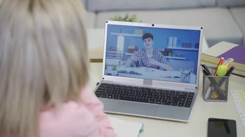 University student girl studying online lesson with her friend.