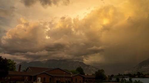 Stormy sunset timelapse over church in Utah