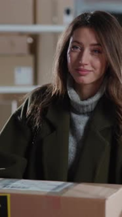 Courier in Post Office Giving Delivery Parcel to Female Customer Portrait of Smiling Positive