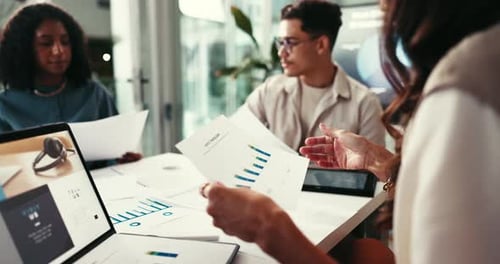 Team Analyzing Financial Data in Modern Office
