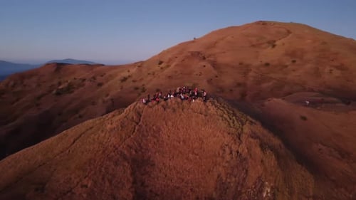 Aerial video of Mount Pulag at sunset with people in the background, the third highest mountain