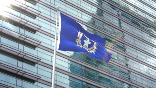 Northern Mariana Islands Flag Waving at Modern Office Building