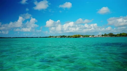 Sea view of tropical green landscape in the Mauritius island. Oceanic seaside tranquility.
Turquoise