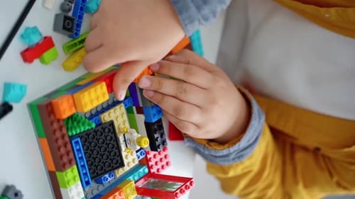 Robotics Programming Class Children Construct and Code Robot STEM Education Using Constructor Blocks