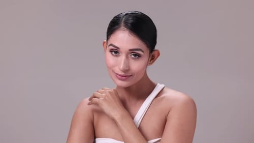 Beautiful Woman Posing with Elegant Makeup and Style