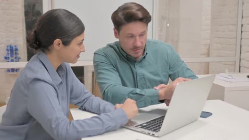 Multi Ethnic People Talking while Working Online