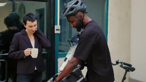 Food Delivery Employee Giving Food in Paperbag to Customer