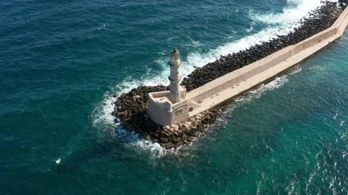 Venetian Lighthouse Of Chania At The Port In Crete Island, Greece. aerial orbit