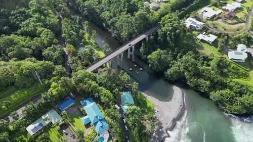 Bird's eye view aerial of Honolii Stream Bridge in Hawaii state, USA, day
