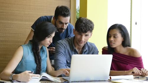Group of people working together at a table