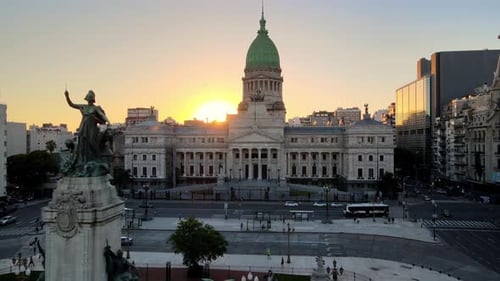 Cinematic drone forward flying pass the pedestal statue monument of two congresses at congressional
