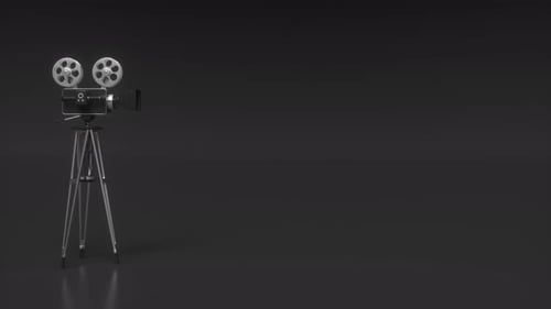 Old projector with film reels spinning and light flickering, horizontal copy space, loop background