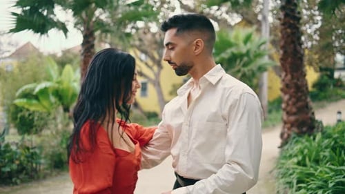 Young Professionals Dancing Energetic in Park Couple Dancers Enjoy Latino Dance