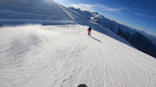 Snowy Mountain Skiing Adventure on Sunny Winter Day