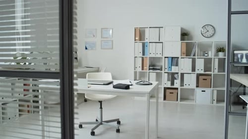 Workplace of Clinician with Work Supplies in Spacious Office in Hospital