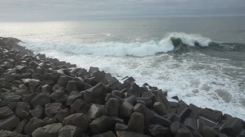 Crashing Waves on Rocks Aerial view