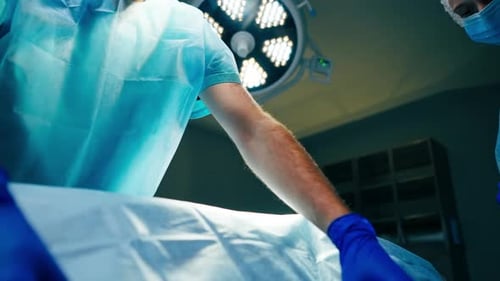 Surgeons Prepare for Operation in Hospital Room