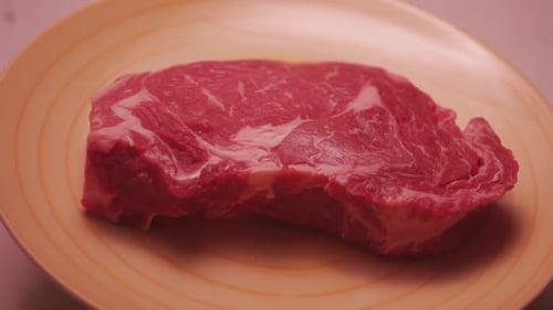 Fresh Raw Beef Bone Rib Roughly Close Up Fresh Piece of Raw Red Meat Closeup Macro Shot of a Fillet