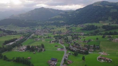 Aerial Panoramic Footage of Village or Small Town in Mountain Valley Beautiful Alpine Landscape