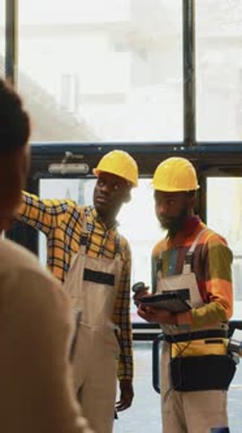 Vertical Video Team of Men Working on Stock Inventory in Warehouse