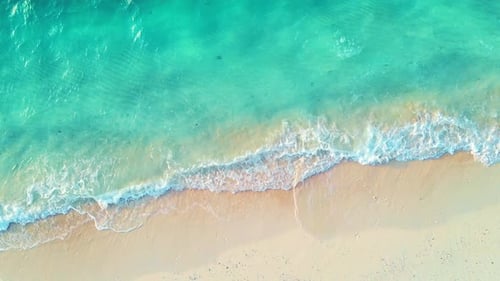 Aerial View of Ocean Coastline and Sandy Beach