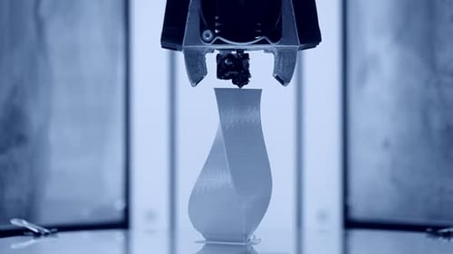 Close Up of 3D Printer Creating Twisted Vase