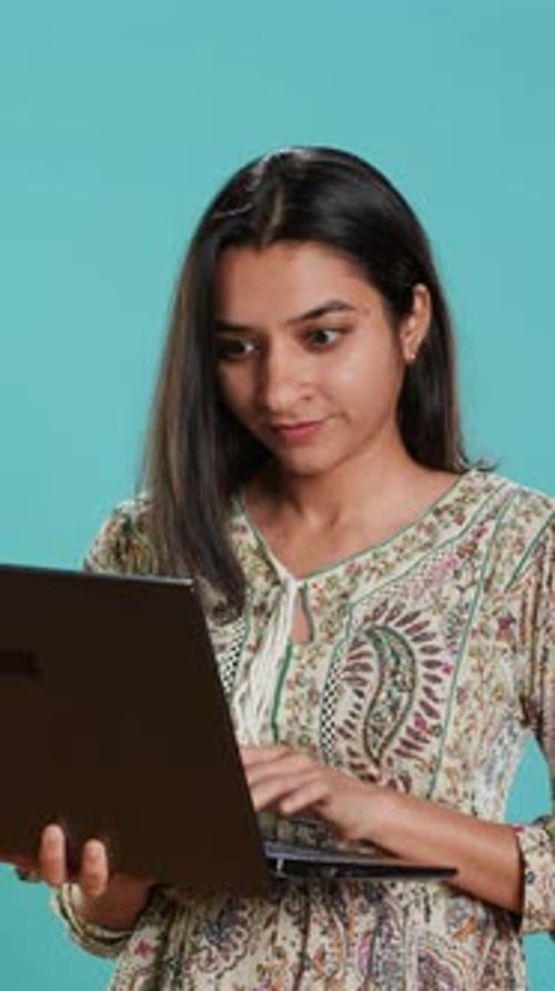 Vertical Video Woman Composing Email Typing on Laptop Frustrated with Malfunctioning Keyboard