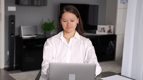 Portrait of Smiling Young Business Woman with Laptop in Home Workplace Home Office Home Studying or