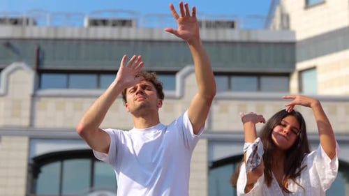 Close Up of Different Young People Males and Females Dancing and Jumping in Good Mood on Sunny Day