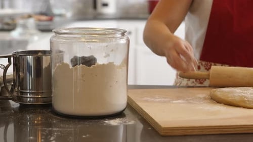Using Rolling Pin to Roll Cookie Dough Baking
