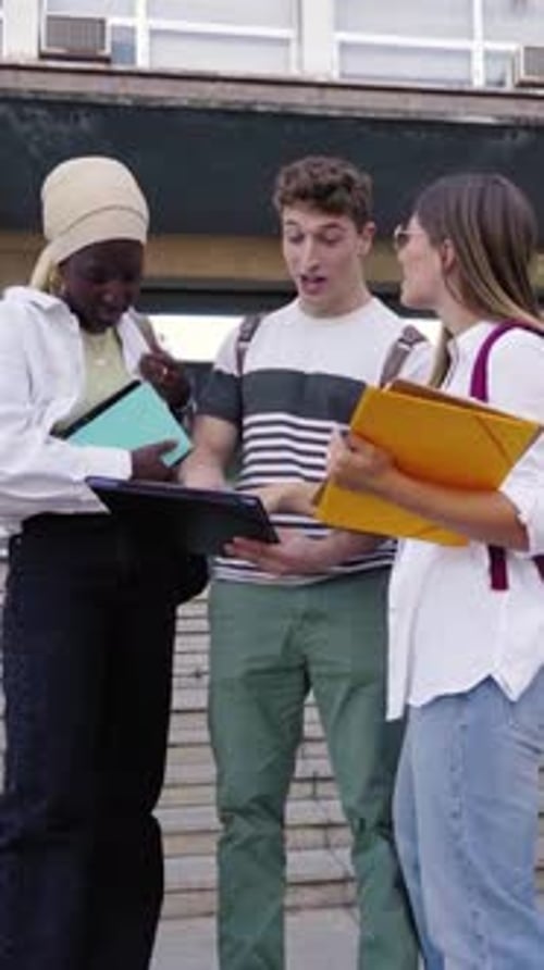 Group of Friends Gathering During Break Time at School Talking and Discussing About Homework