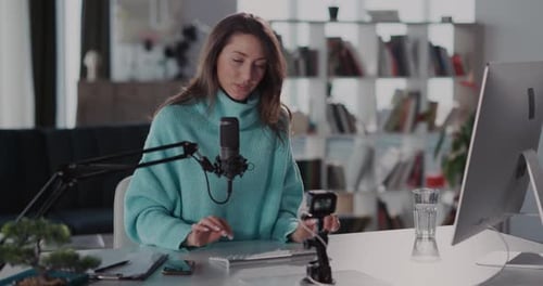 Woman Recording Video Blog in Modern Home Office
