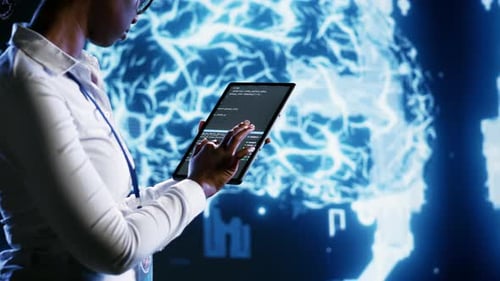 Woman Uses Tablet in Front of Brain Graphic