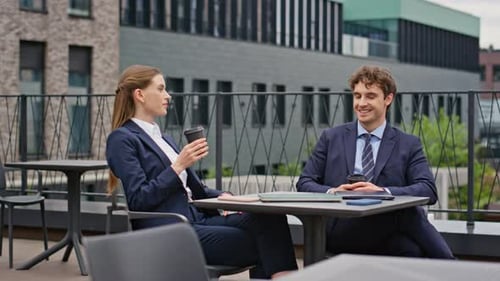 Colleagues Taking Coffee Break at Outdoors Restaurant Meeting Relaxed Partners