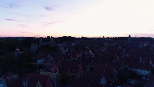 aerial view drone flies over the ancient city and the tower gate of the city
