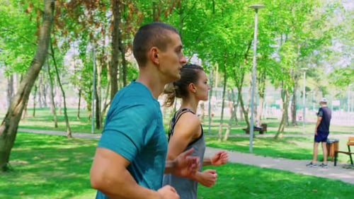 Couple Jogging in the Park