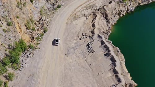 Car driving near lake