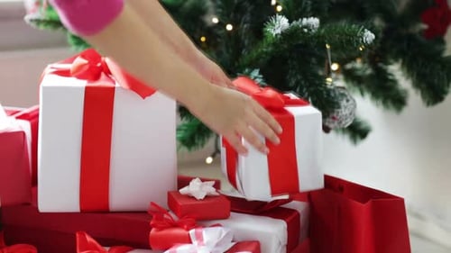 Presents Under Christmas Tree with Red and White