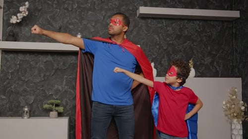 Superhero Father and Son in Costume