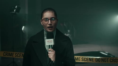 Female News Reporter at Smoky Crime Scene