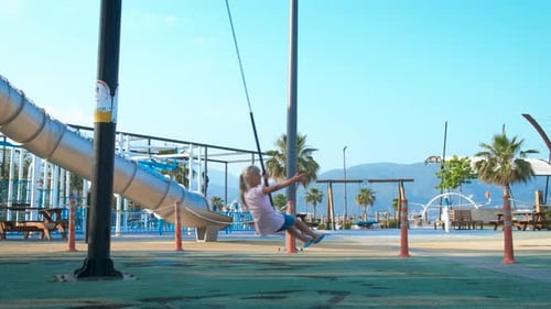 Cute Children Have Fun on the Playground