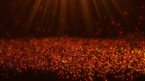 Abstract golden glowing particles rise up and are illuminated by bright rays of light, background