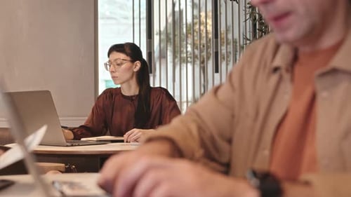 Freelancers Working in Cafe