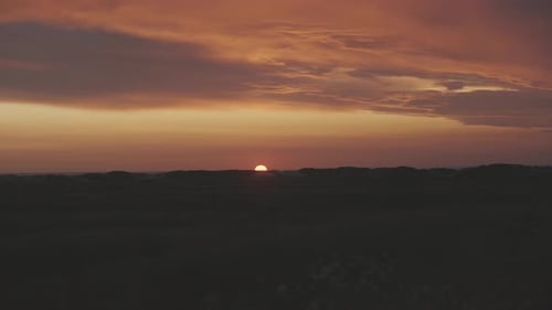 Sunset Over the Ocean Horizon at Dusk