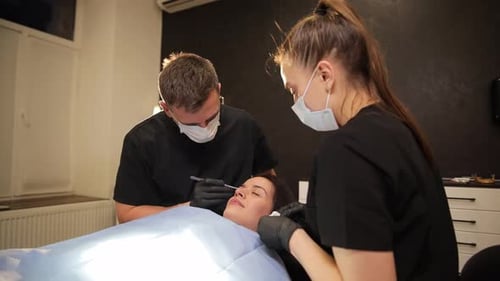 Woman Undergoing Medical Procedure in Hospital